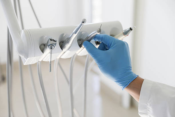 Professional Root Canal Treatment technician working in USA